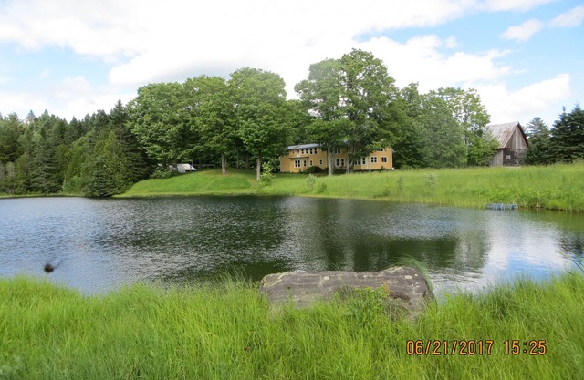 450 Acre renovated 1840's 4 bedroom, 3 1/2 bath farmhouse, with large pond.