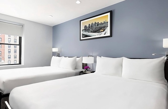 4x Deluxe Two Queen Beds Room at OYO Hotel Times Square