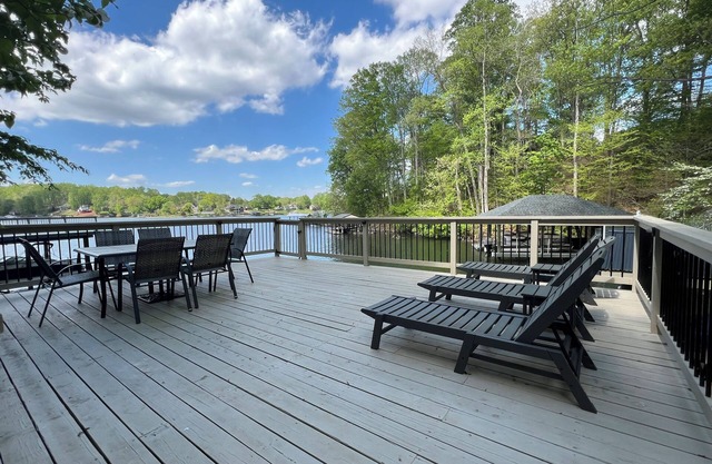 5 Bed 4 Bath Waterfront Home on Deep Water Cove Ideally located by car or boat!