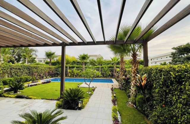 5-bedroom villa with private pool & garden in palm valley-6th october