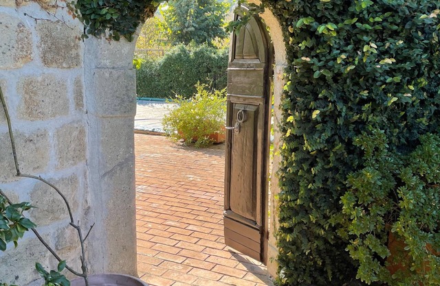 5 bedroom villa with heated pool and air conditioning set in landscaped garden.