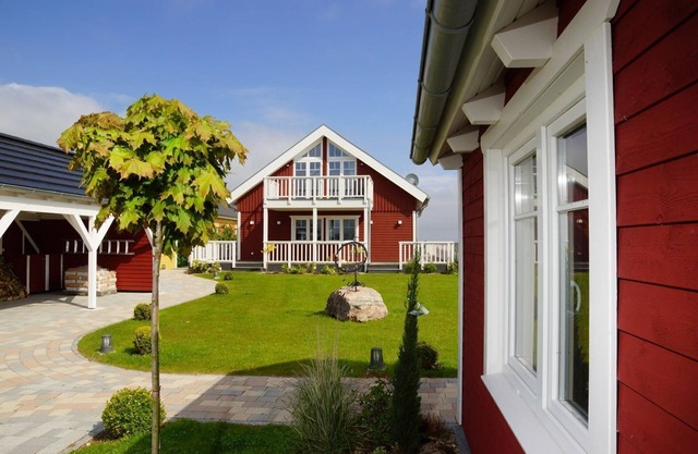 5-star vacation home "Thor's Schleilounge" directly on the Schlei and Baltic Sea with a view of the water, to treat yourself to a well-deserved break from everyday life as a couple or with the family in the Baltic Sea resort of Olpenitz