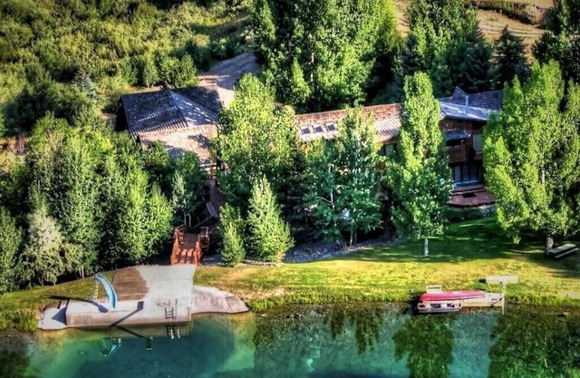 7,000 SQ FT CABIN ON 150 ACRES PRIVACY WITH ITS OWN PRIVATE LAKE.