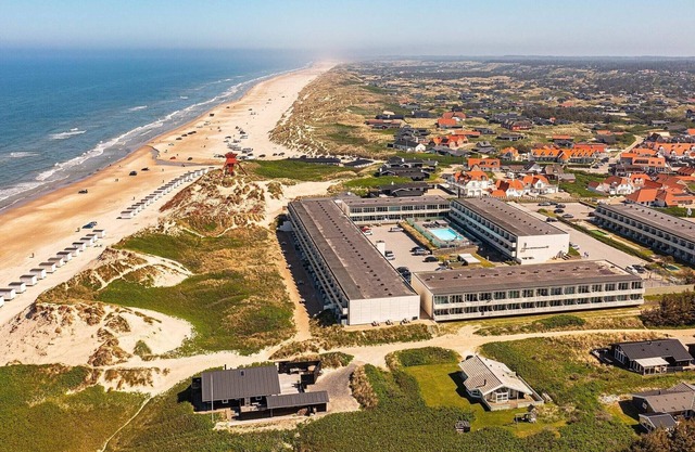 8 person holiday home on a holiday park in Blokhus
