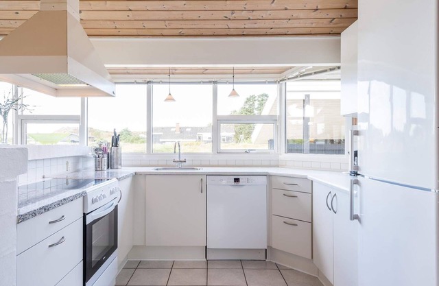 8 person holiday home in Henne