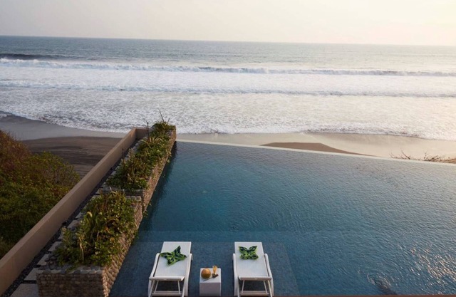A brand new ! 50% off- absolute beachfront retreat