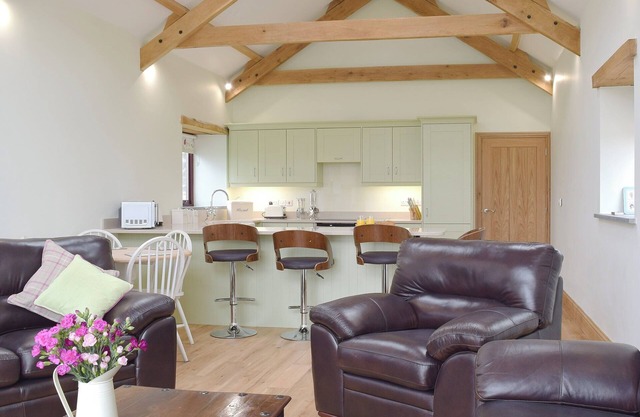 A characterful barn, delightfully converted to offer open-plan living.