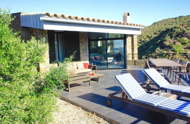 A charming family home with private pool in Cadaques with sea views.