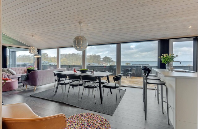 A fantastic panorama over the forest and the sea awaits you in this vacation home.