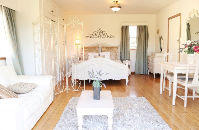 A French style boutique guesthouse set in a large garden with a spa and pool.