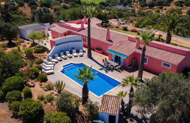 A hilltop retreat with sweeping views and modern comforts.n