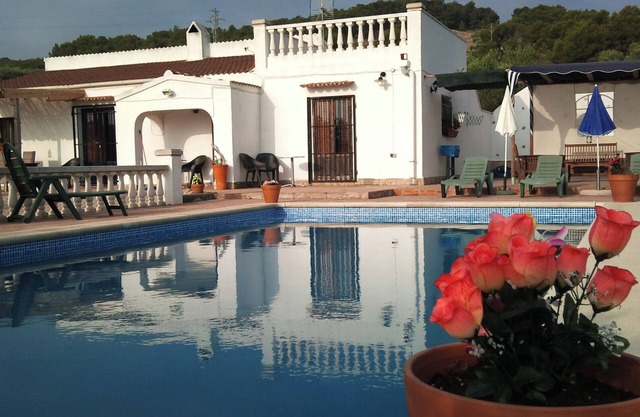 A house with a big pool year fantastic views