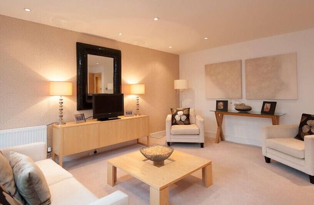A modern open plan two-bedroom apartment, sleeping 4.