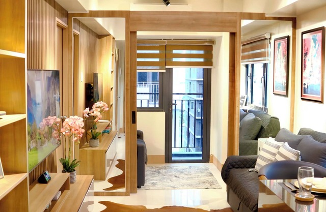 A newly built 2-bedroom condo in the heart of Pasay, strong WiFi, gym & near MOA