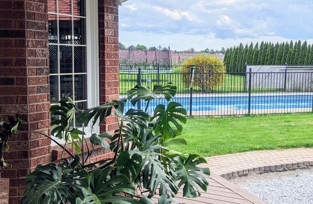 A poolside guest suite nested in a beautiful orchard along winery route