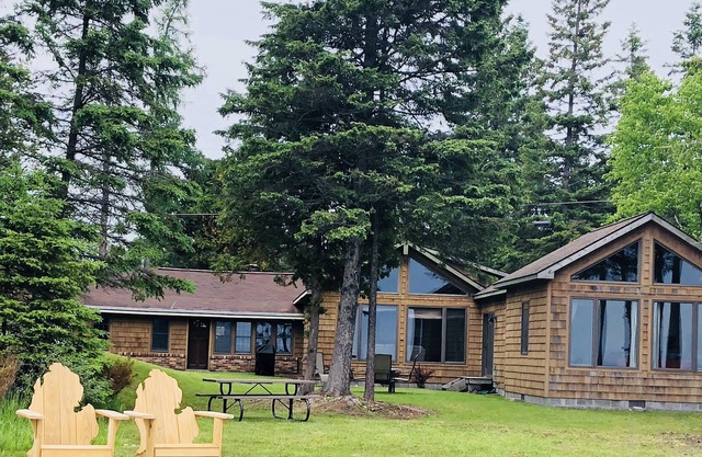 A private beach on the Lake Michigan shore makes this a one of a kind!