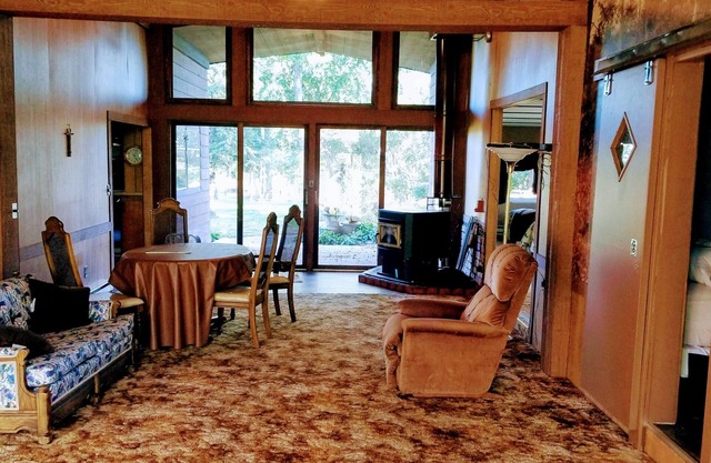 A roomy ,but cozy lodge on 10 acres with trees,private location