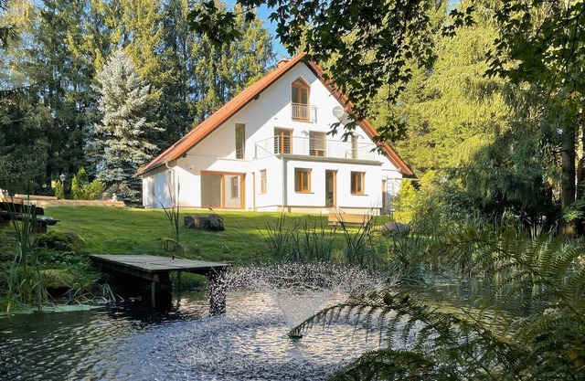 A spacious holiday home in the midst of beautiful nature with a large garden