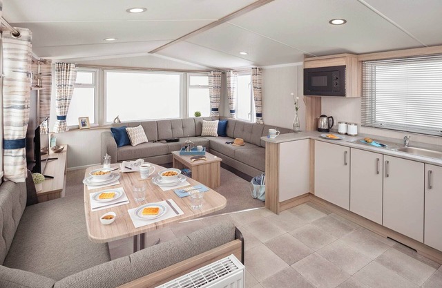 A spacious open plan holiday home with one master double and two twin bedrooms.