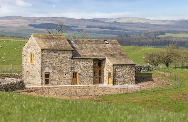 A stunning barn conversion sleeping 7 guests with hot tub located at an award winning wellbeing resort