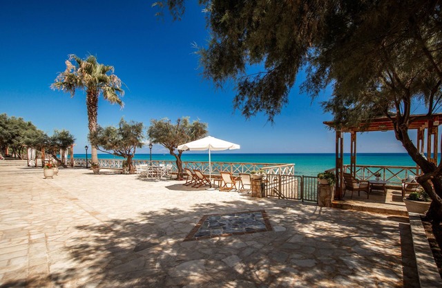 A stunning villa by the Ionian Sea, complete with BBQ, Jacuzzi, and more.