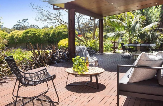 A stylish and modern home, situated in manicured gardens.