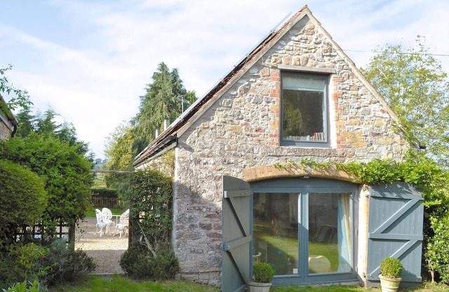 A stylish barn conversion offering high spec open plan accommodation.
