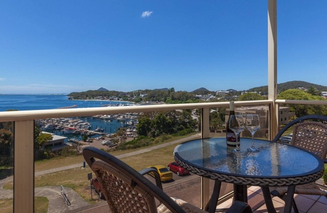 A top floor unit with panoramic views over the marina