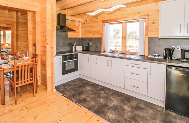A top quality lodge with stunning views of the Snowdonia mountain range in the distance.