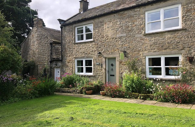 A Traditional Dales Cottage with log burning stove in the village of Romaldkirk.