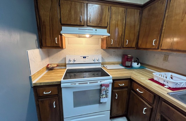 A travelers home, community pool, center location