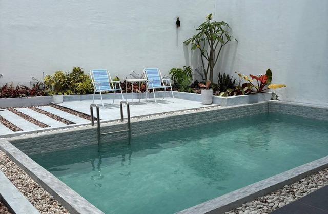 A villa with private pool, 3 floors, beautiful views, and complete amenities.