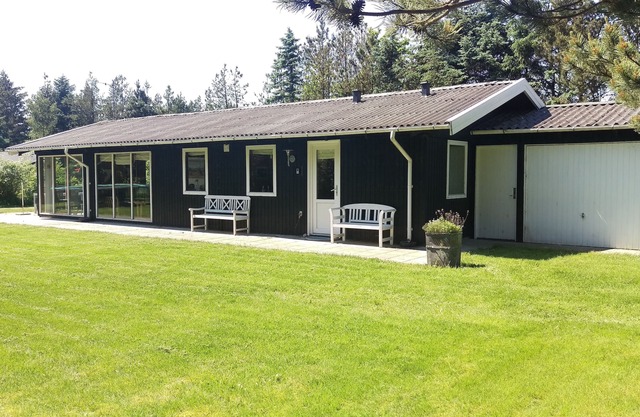 A wooden house on the beautiful West Coast with the width beautiful beaches.
