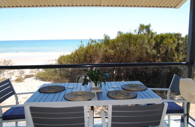 Absolute beachfront 2 bedroom upstairs unit SAndy Feet 🦶 3