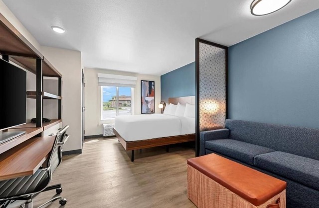 Accommodates 3 Suites | King Bed + Kitchen & Sofa