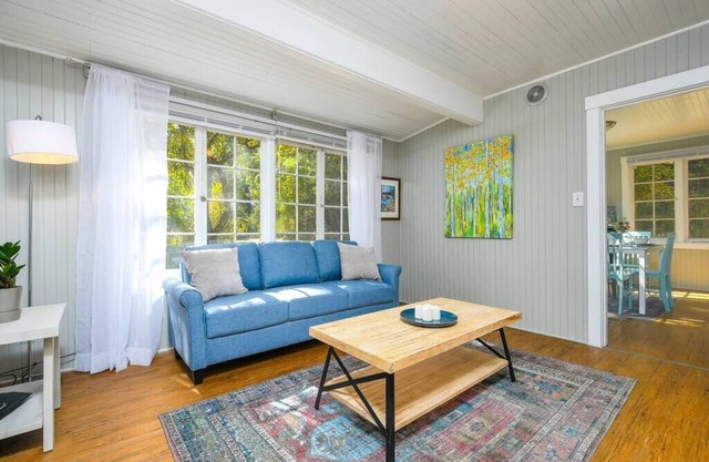 Adorable cottage among trees close to everything