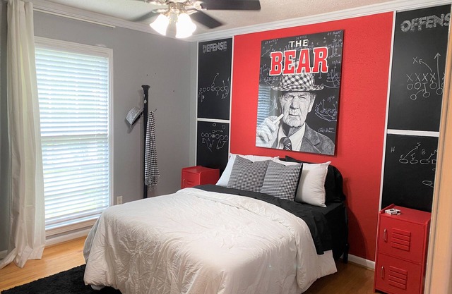 Alabama themed home with fenced yard and courtyard