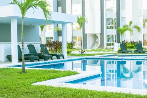 Alberca, Playa Cercana & Club de Playa opcional -Departamento E13D302