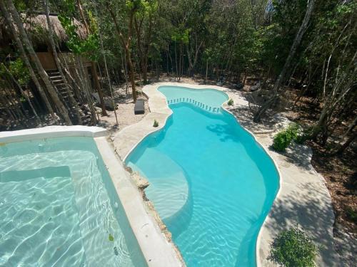 Aldea Maya-Ha Cabañas con cenotes