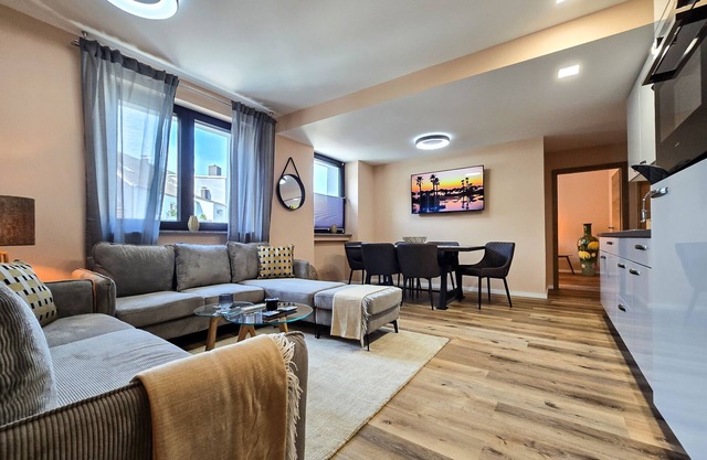Alpha Apartments: 3BR Grand Space, Urban Harmony
