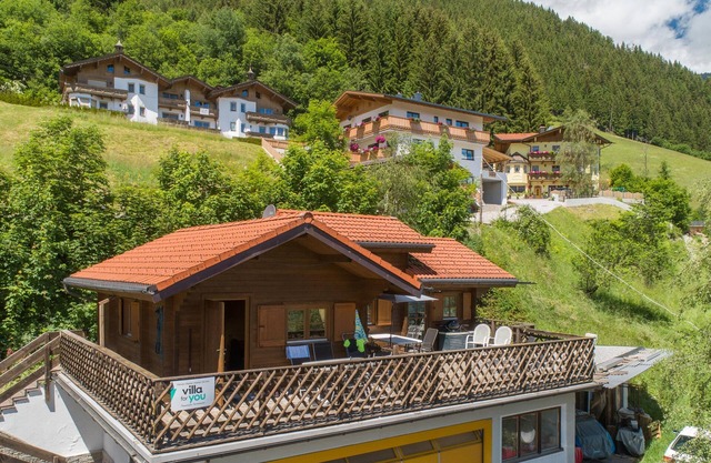 Alpine hut with a terrace and views