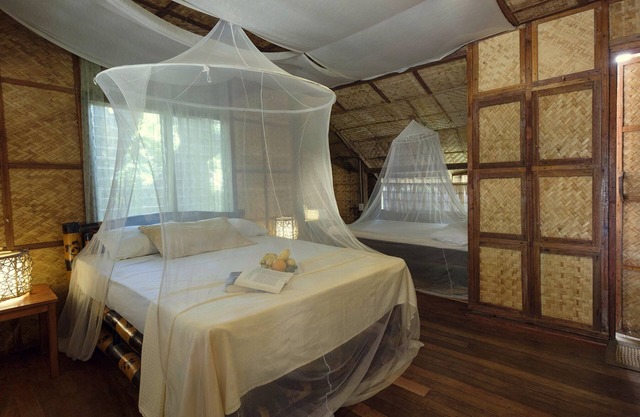 AMAMI BEACH RESORT, native style 20mt from the seashore