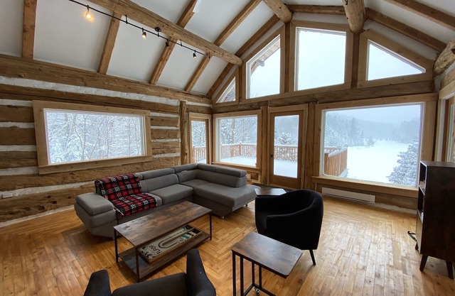AMAZING DOMAIN WITH MODERN LOG CABIN ON THE LAKE FRONT
