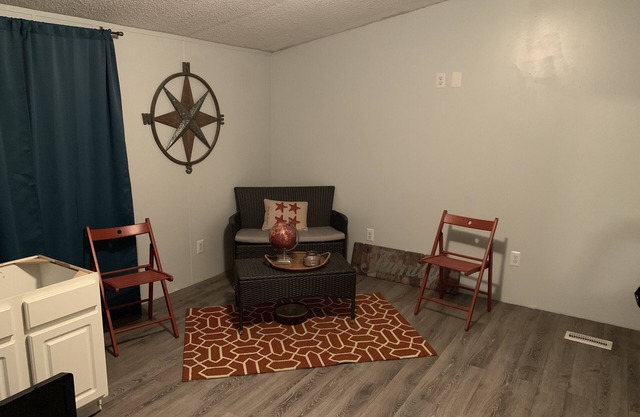 An acre of Country Living not far from the Beach!