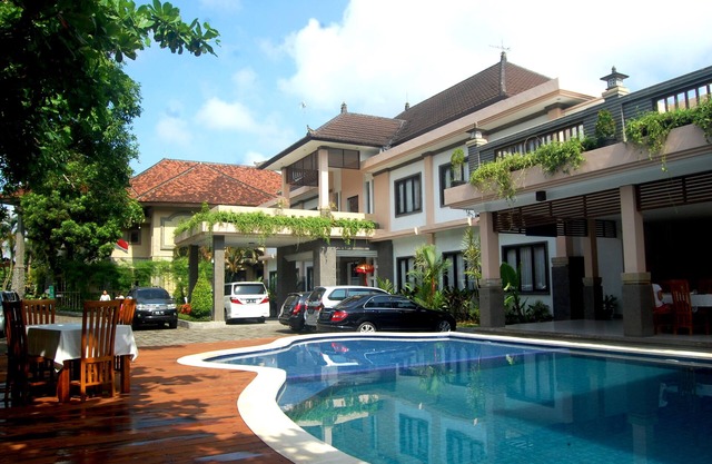 An elegant private Double Room at Dhyana Pura City Hotel in the heart of Bali