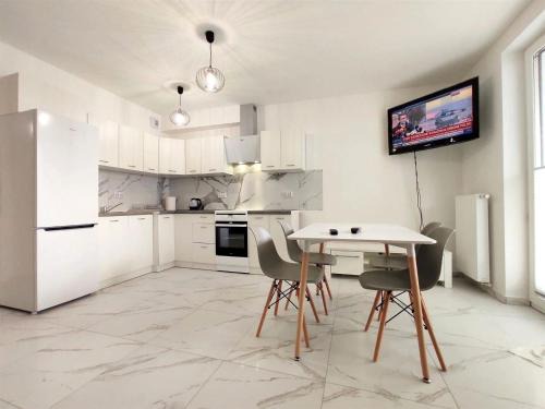 Apartament Julia 1-3 os I piętro z balkonem i garażem