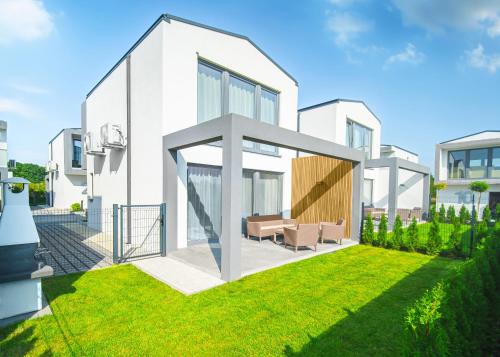 Apartament SUPERIOR Rewal - dwupoziomowy z ogródkiem, całoroczny
