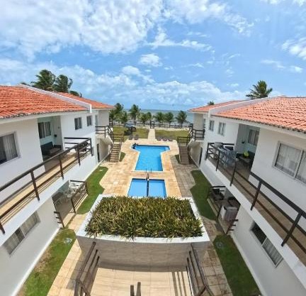 Apartamento Pé na areia no condomínio Manga Verde