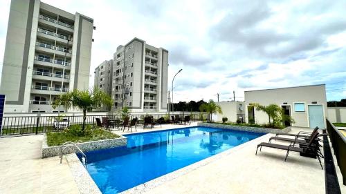 Apartamento Premium com Piscina e Varanda Perto do Aeroporto
