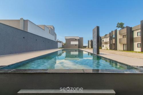 Apartamentos com Piscina a 700m da Praia de Taperapuan NVM